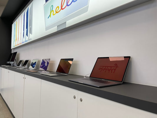 TekStore Apple Store internal image with refurbished MacBooks and iMac in Cornwall